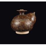 A glazed stoneware Cizhou Kandy, China, Song/Yuan Dynasty, 13th century h cm 10,5