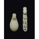 Two white jade dragon belthooks, China, Qing Dynasty, 18th century cm 6,5 e cm 9