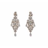 A pair of diamond, gold and silver chandelier earrings. Fitted case montatura in oro ed argento.