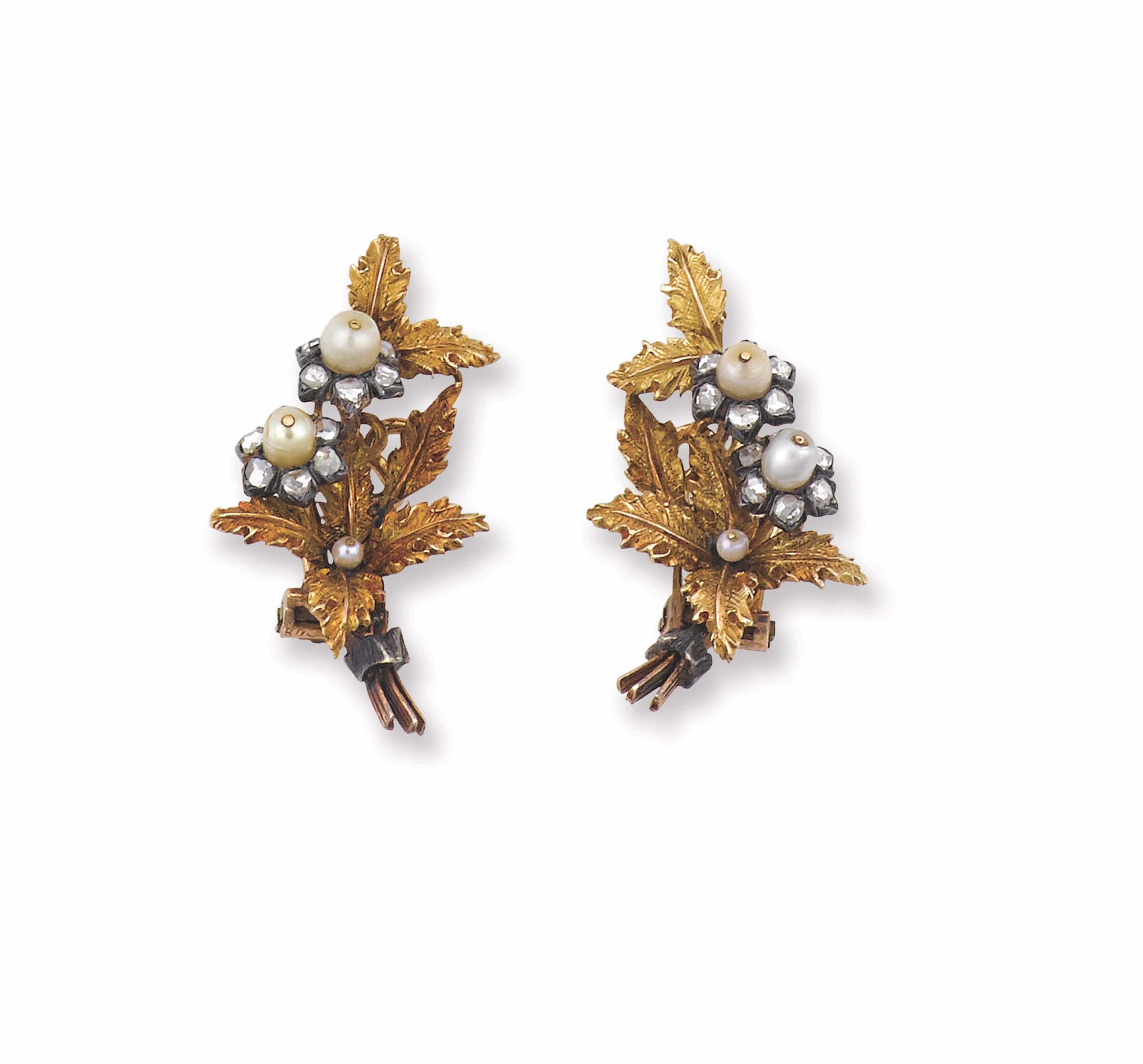 A pair of gold and pearl earrings. Buccellati montatura in oro giallo 750/1000 ed argento