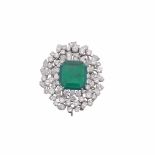 An impressive Colombian emerald, diamond and platinum brooch. Bulgari Esemplare unico. Montatura