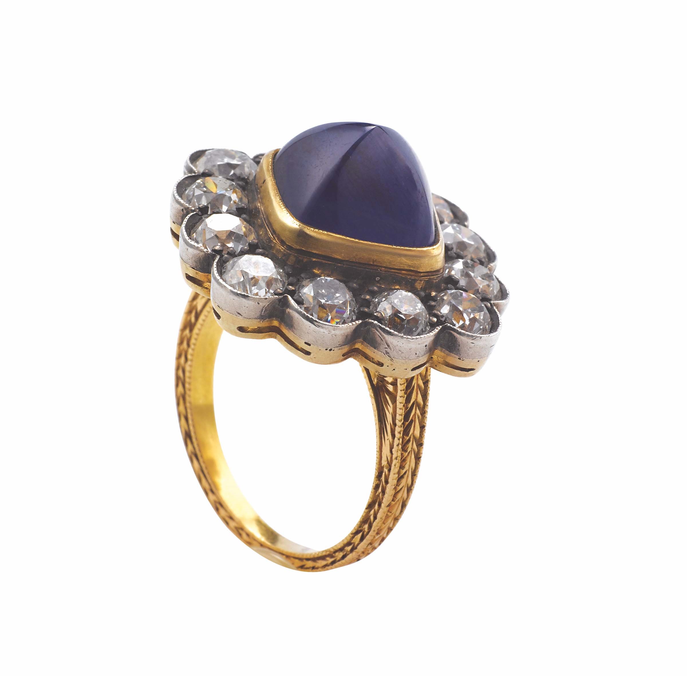 A sugar loaf-cut sapphire and diamond ring. GRS report montatura in oro giallo 750/1000 ed