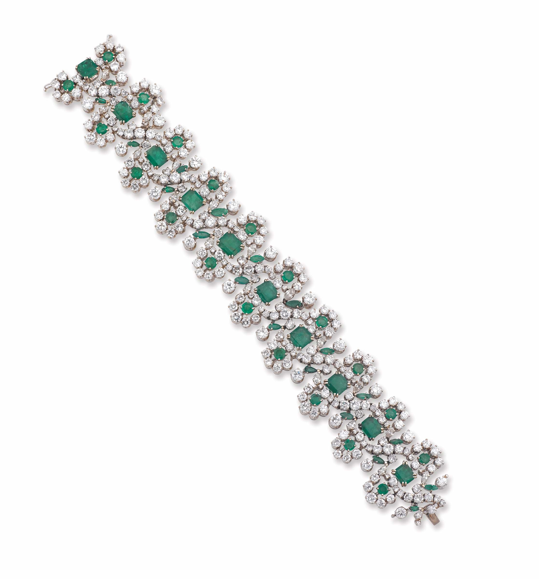 An emerald and diamond bracelet montato in oro bianco 750/1000. Lievi danni