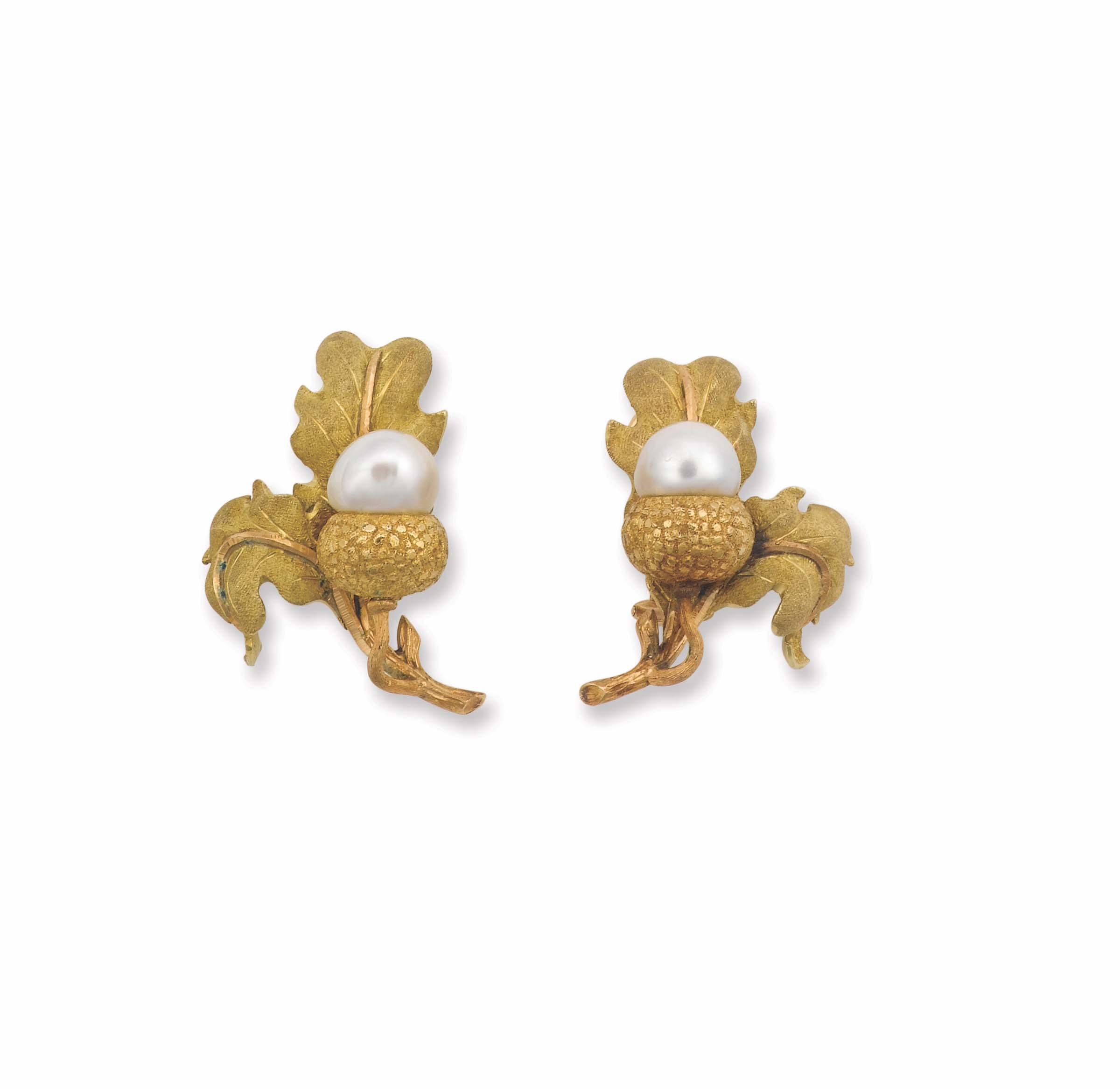 A pair of gold and pearl earrings. Mario Buccellati montati in oro giallo 750/1000