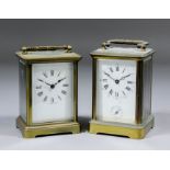 A late 19th/early 20th Century French carriage clock with alarum, the white enamelled dial with