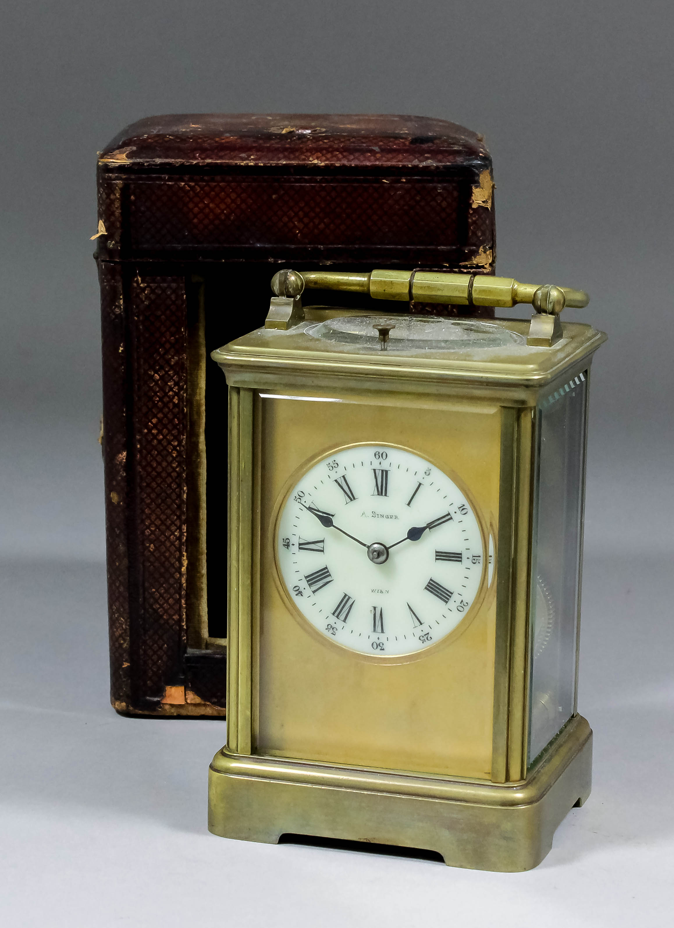 A late 19th/early 20th Century French carriage clock retailed by A. Singer of Vienna, the 2ins