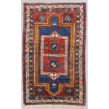 A Caucasian rug of "Farchalu" design woven in colours with a central pole medallion woven with two