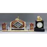 A 1920s French cream and red veined marble cased three piece clock garniture of "Art Deco" design,