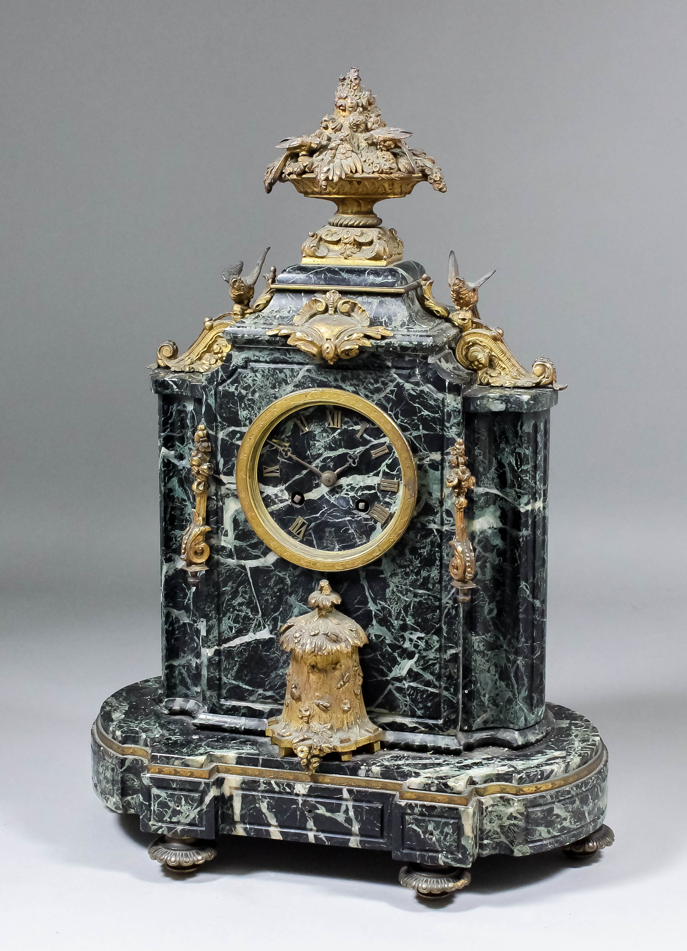 A 19th Century French gilt brass mounted green veined marble mantel clock by Japy Freres, retailed