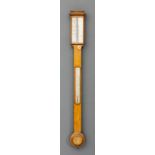 A Victorian oak cased stick barometer and thermometer by Elliott Brothers, 30 Strand, London, with