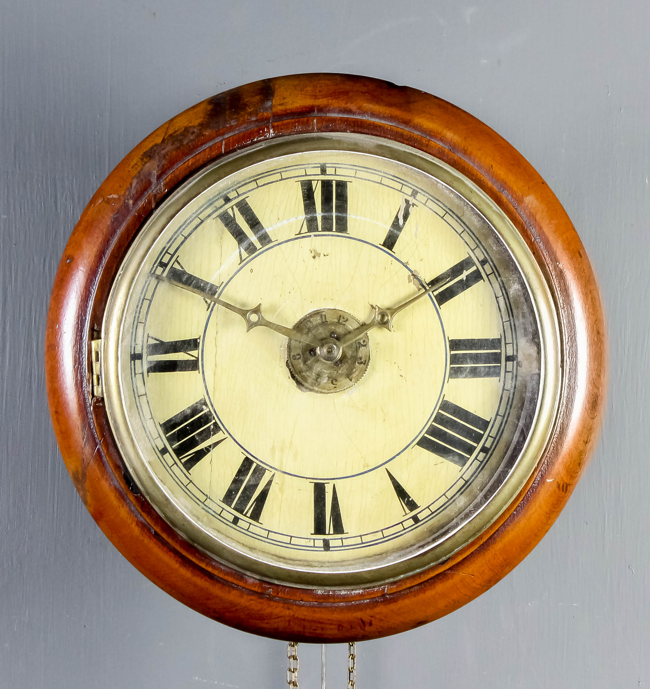 A late 19th Century "Black Forest" "Postman's Alarm" dial wall clock, the 8ins diameter painted wood
