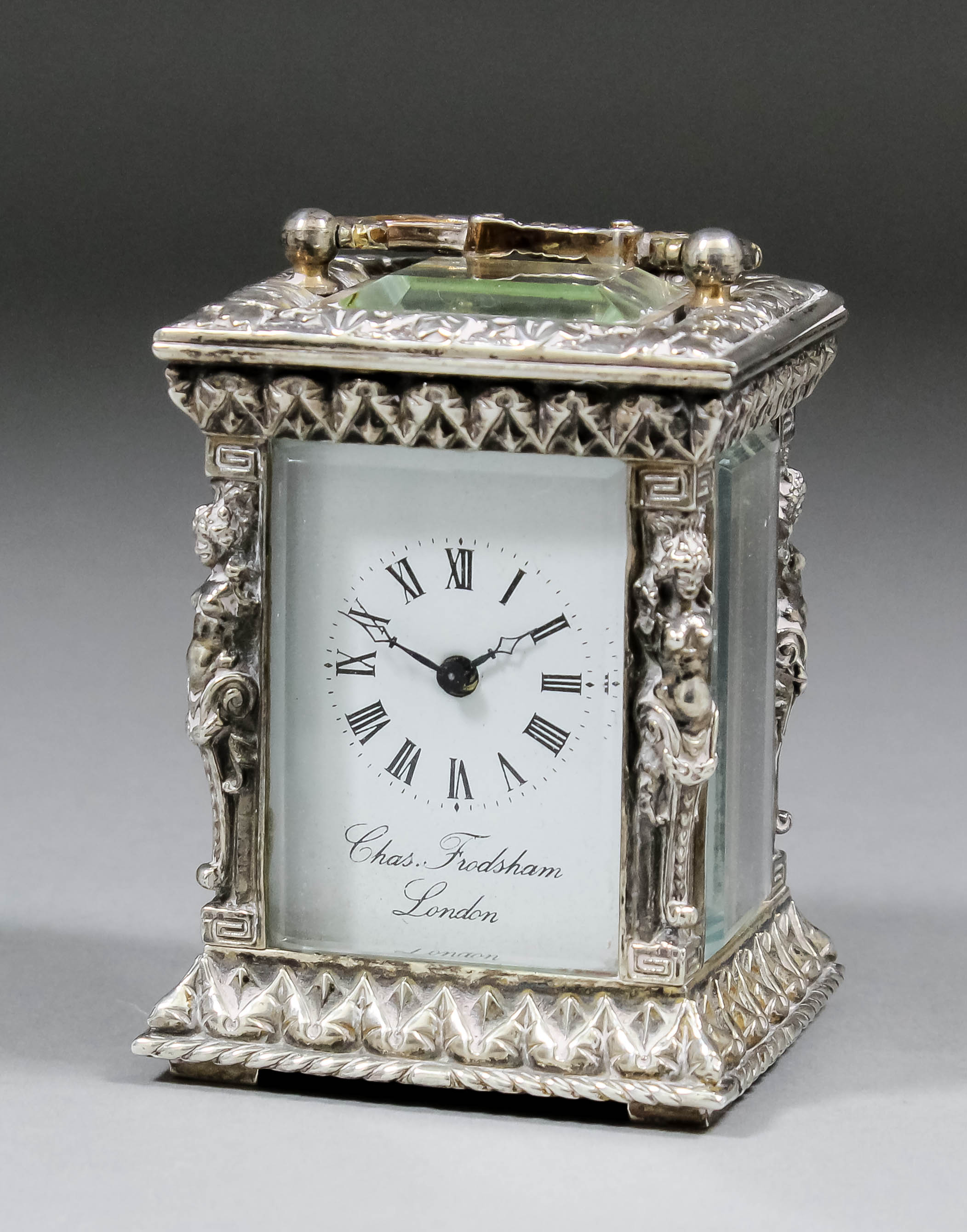 An Elizabeth II cast silver cased miniature carriage timepiece by Charles Frodsham of London, the