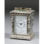 An Elizabeth II cast silver cased miniature carriage timepiece by Charles Frodsham of London, the