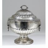 A 19th Century silvery metal two-handled bowl and cover with part reeded ornament, the cover with