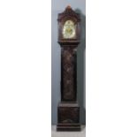 An oak longcase clock of small proportions by Daniel Fowler of London, the 8ins arched brass dial