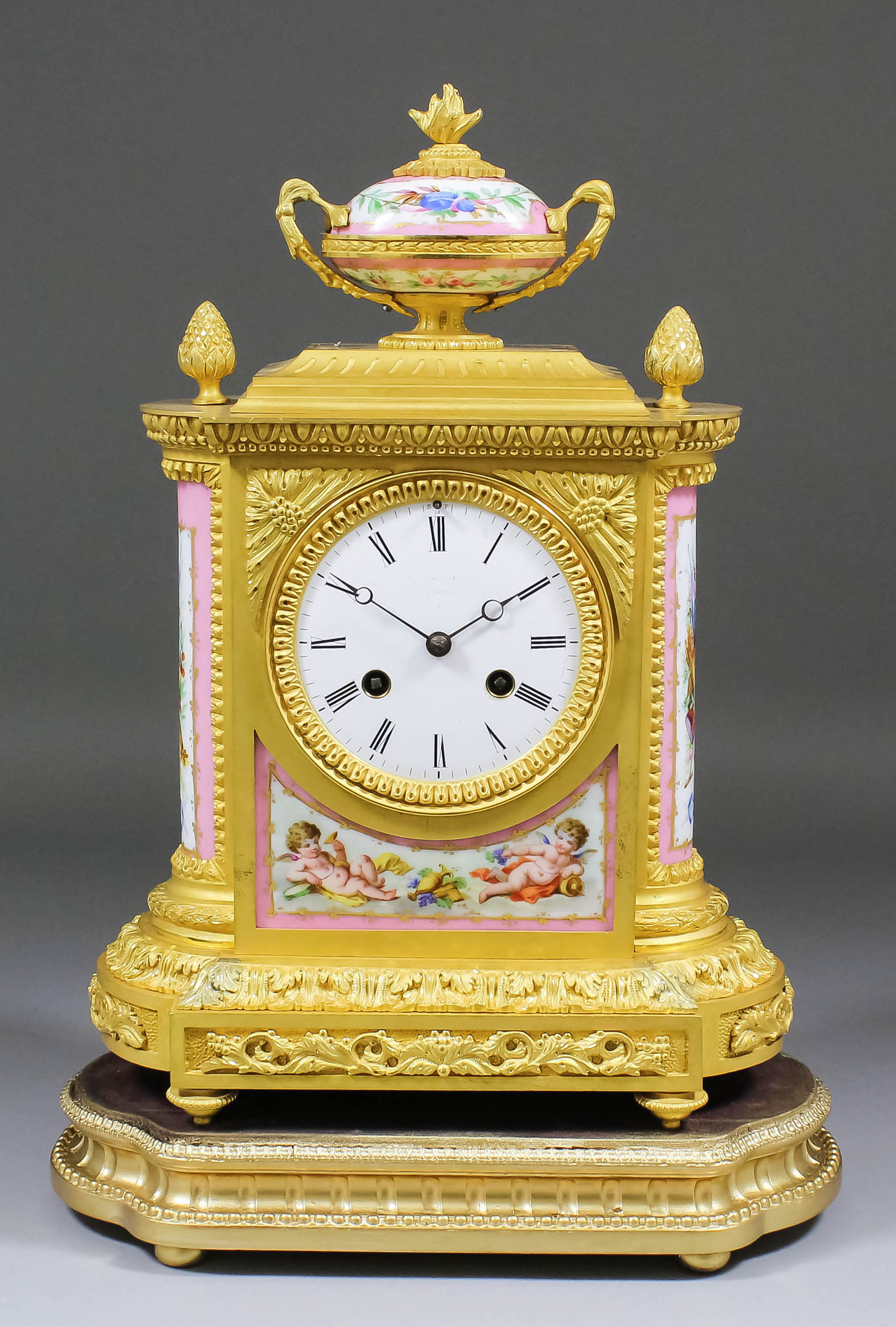A mid 19th Century French ormolu and porcelain mounted mantel clock by J.B.D., No. 2936 16, the 3.