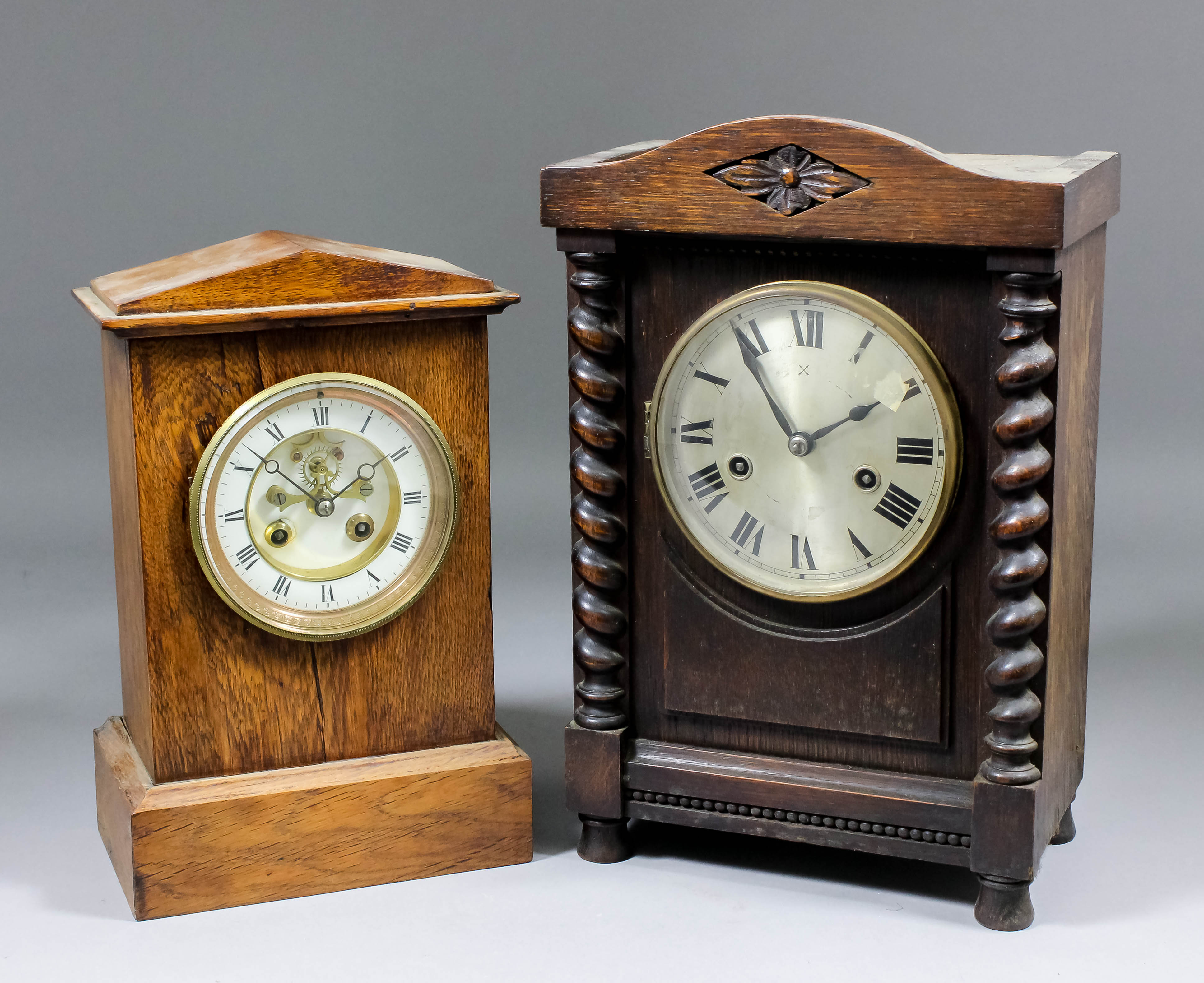 A late 19th Century French oak cased mantel clock, the 3.75ins diameter white enamelled chapter ring