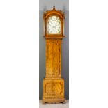 An early 19th Century mahogany longcase clock by Lepine of Canterbury, the 12ins arched painted dial