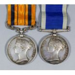 A pair of Victoria medals, South Africa Medal dated 1879 and a Long Service Good Conduct Medal,