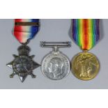 A group of three George V First World War medals comprising, 1914 Star with Mons clasp, British