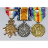 A group of three George V First World War medals comprising,1914 Star with Mons clasp, British War