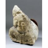 A 12th/13th Century Caen Stone corbel of a praying angel, 9ins high, (possibly from Northern