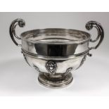 An Edward VII silver circular two-handled rose bowl with moulded rim and girdle, cast with leaf