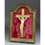 A 19th Century French carved ivory Corpus Christi mounted on gilt crucifix, 11ins high, in a gilt