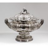 A good George IV silver circular two-handled tureen and cover, the squat lobed body with bold cast