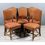 A set of eight late Victorian / early 20th Century oak dining chairs with arched crest rails, the