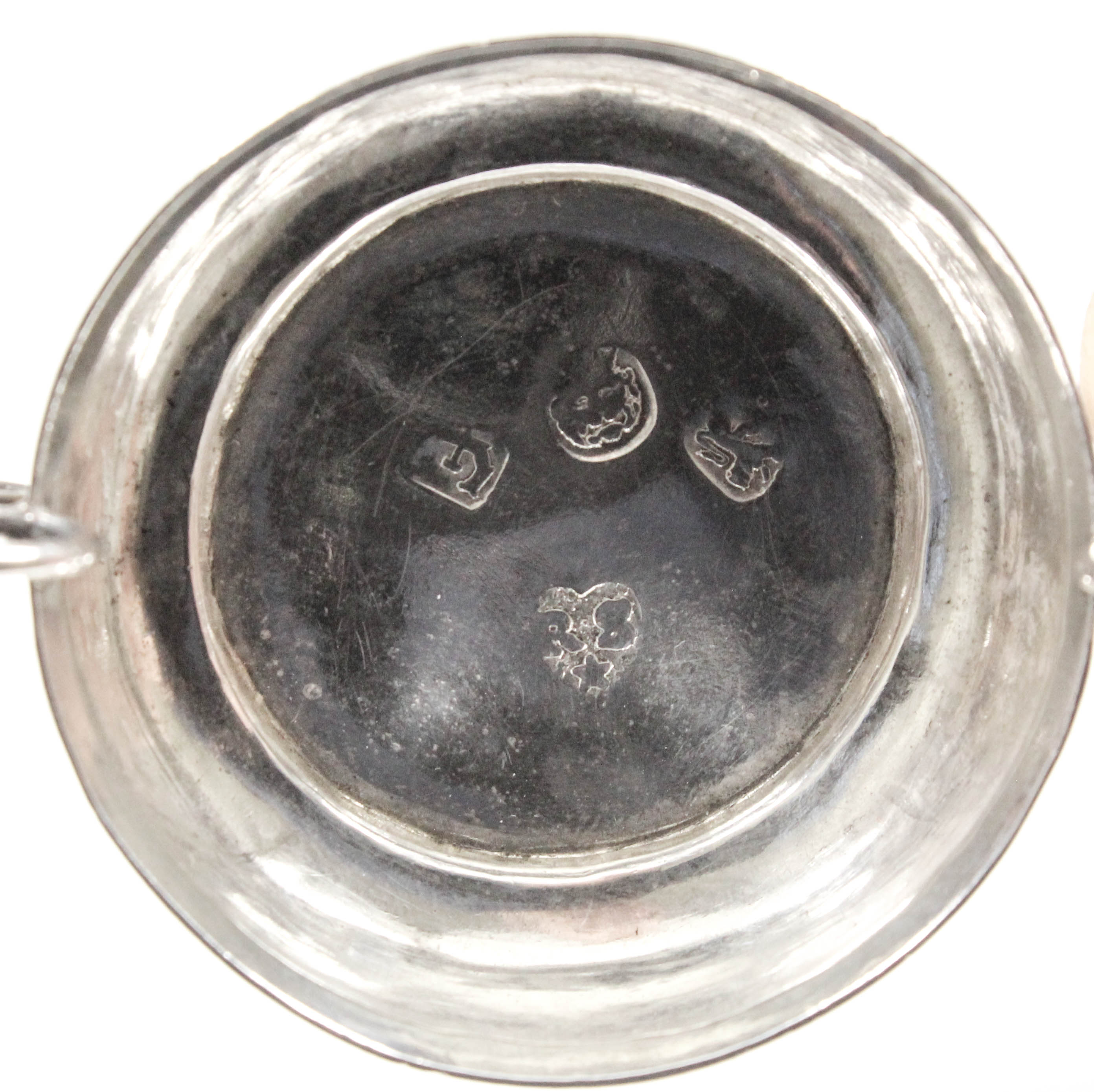 A Charles II silver miniature two-handled taste-vin with shaped and moulded rim and twin wirework