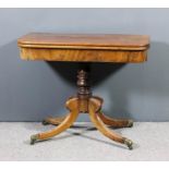 A George IV mahogany rectangular tea table with rounded corners, the plain folding top on turned