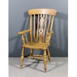 A 20th Century stripped wood slat back Windsor kitchen chair with plain curved crest rail, fretted