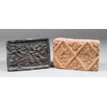 A late16th Century fire brick, the moulded design of two rampant facing lions within a diamond