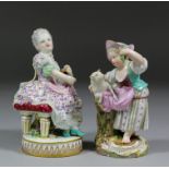 A late 19th Century Meissen porcelain figure of a young woman holding a musical score, 5.5ins, and