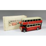 A Triang Minic No. 60M Pre-War Double Decker Bus with dark red body with stone coloured roof, "