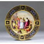 A late 19th Century "Vienna" cabinet plate, the centre painted with a classical scene - "Briseis