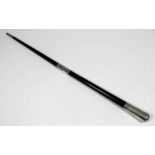A George V silver mounted ebonised conductor's baton, the mounts engraved with oval cartouche and