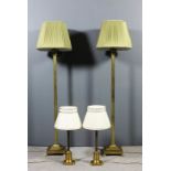 A pair of 20th Century brass electric standard lamps of Corinthian column pattern on square