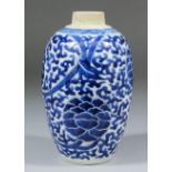 A Chinese blue and white porcelain ovoid jar in the Kangxi manner, painted with stylised peonies