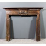 A 20th Century mahogany fire surround with moulded dentil cornice, with central rectangular panel to