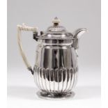 A George III silver coffee biggin, the slight baluster shaped body with bold reeded base, the