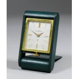 A 1960s Jaegar Le Coultre gilt metal cased travelling alarm case, No. 123273, the silvered dial with