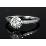 A modern 18ct white gold mounted diamond solitaire ring, the brilliant cut stone approximately .75ct