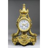 A mid 19th Century French ormolu cased mantel clock by Balthazard, the 5ins diameter white enamelled