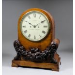 A William IV pollard oak mantel clock by J. Kent of Saffron Walden, the 8ins diameter circular