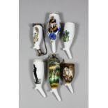 A collection of German and Austrian printed and painted porcelain pipe bowls, including -