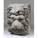 A late Medieval stone head of a lion wearing a benign expression, 9.5ins wide x 10ins deep x 13.5ins