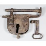 A 17th Century wrought iron padlock and key, 9ins wide