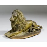 A late 19th Century bronzed white metal lion pattern inkwell on oval base, 4.5ins high